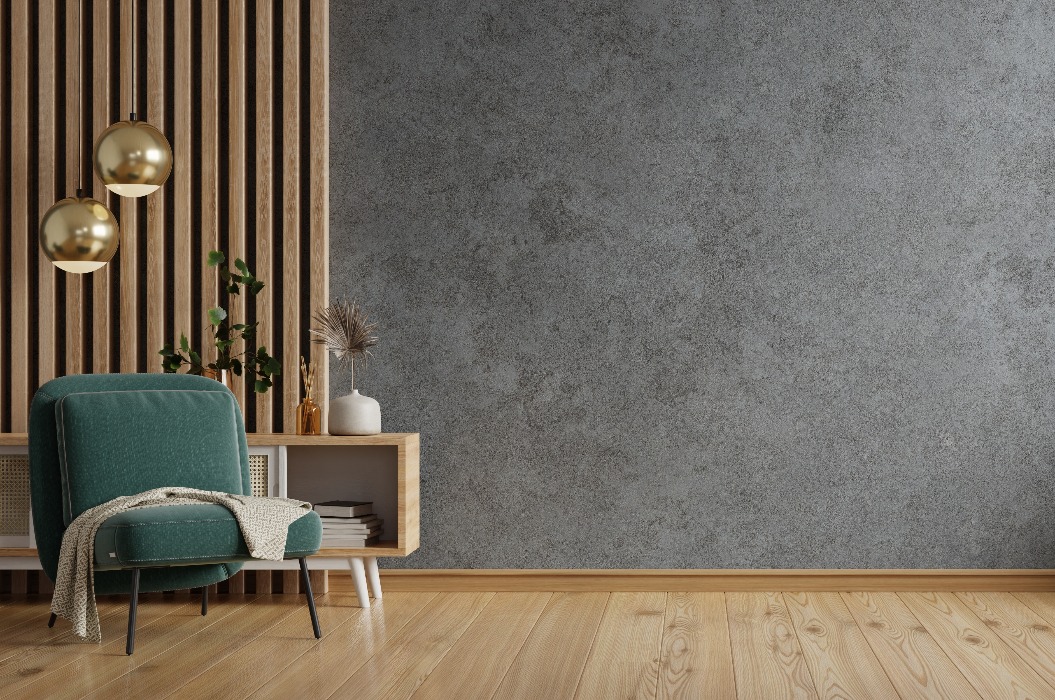 Wohnzimmer mit grünem Sessel auf leerer dunkler Betonwand Hintergrund.3d Rendering